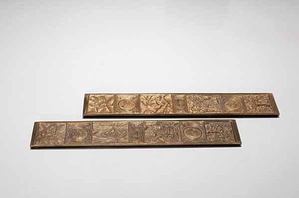 Tiffany Studios Bookmark Blotter Ends : Tiffany Studios Bookmark Blotter Ends A pair of Tiffany Studios blotter ends in the bookmark pattern. Underside marked Tiffany Studios New York 992; l. 12.25 in.
