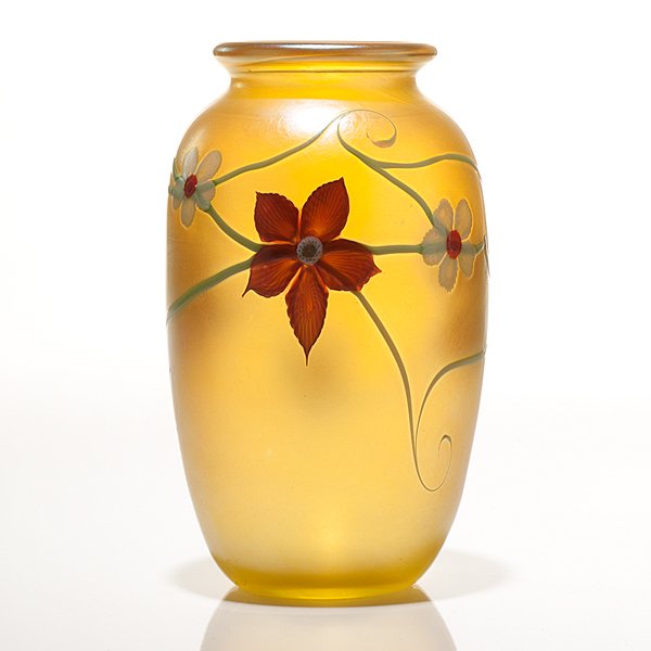 Orient & Flume Iridescent Glass Vase : Orient & Flume Iridescent Glass Vase American, 1983. An Orient & Flume art glass vase, with applied floral and vine decorations against an iridescent gold body. Underside marked Orient & Flume, 198