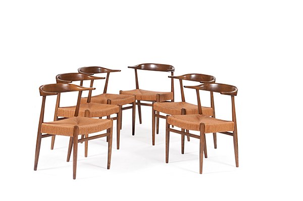 Folke Ohlsson Dining Table and Chairs : Folke Ohlsson Dining Table and Chairs Swedish, 20th century. A dining table and six chairs, attributed to Folke Ohlsson for Dux of Sweden. Six hardwood chairs have woven seats. Underside of table m