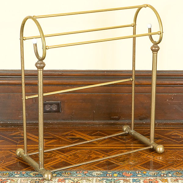 Brass Towel Racks : Brass Towel Racks 20th century. A pair of brass towel racks of shepherd's crook form with four hanging bars; ht. 31, wd. 27, dp. 11 in.