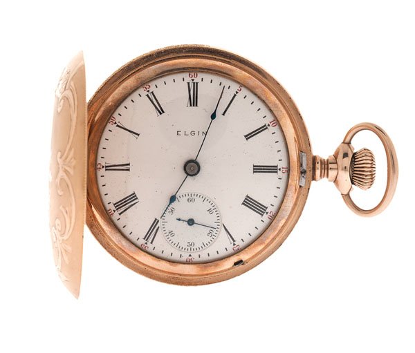 Elgin National Watch Co. Hunter-Case Pocket Watch Ca.: Elgin National pocket watch, ca. 1905. Movement number 11809542. Size 18. Keystone J. Boss 25-year case #7522576. 7 jewel. Stem-wind and lever-set. Blued spade hands and white porcelain dial. Roman