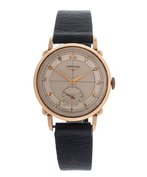 Longines Automatic in 14 Karat : A 14k yellow gold Longines 17 jewel automatic wrist watch. Longines 22A automatic movement. Movement number 8029740. L&K 14k yellow gold case number 3539. Two-tone dial with sub-seconds. Gold-tone han