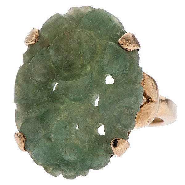 Tiffany & Co. 14 Karat Gold Carved Jade Ring : A Tiffany & Co. 14k yellow gold ring featuring a carved and pierced jade in a floral design. 20mm x 15mm jade center. Signed Tiffany & Co. inside shank. 3.3 dwt. Size 3.75