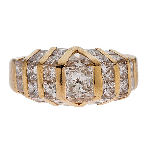 Mister Baguette Princess Cut Diamond Ring in 18 Karat: An 18k yellow gold fashion ring from Mister Baguette containing thirty two VS2, G color princess cut diamonds weighing approximately 2.25 carats total weight, two VS2, G color trillion cut diamonds we