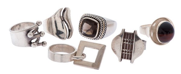 Six Designer Rings in Sterling Silver : A group of six silver rings including designers such as Andreas Mikkelson, David Anderson, Hans Hansen, and Anna Greta Eker. The first ring is a sterling ring signed by Georg Jensen designer Andreas M