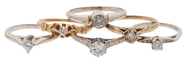 Diamond Solitaires in 14 Karat : A group of six 14k gold solitaires containing center diamonds ranging from approximately .05 carat to approximately .50 carat. Some with accent stones. Average SI2, H color. 7.8 dwt. Sizes 4.25-8