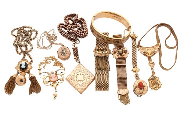 Victorian Era Jewelry Including Cameos : A large collection of Victorian era jewelry with various stones and cameos. There are two mesh linked bracelets with slides and tassel fringe which feature seed pearls and pink and red stones. There 