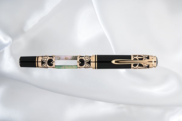 Rossi/Pelikan 1990s Lotus and Pearl LE Fountain Pen : Rossi/Pelikan 1990s Lotus and Pearl LE Fountain Pen This pen exhibits a design quite popular in Rossi pens. It is the Lotus Blossom, here seen adorning three sections of this large, Pelikan M800 pen