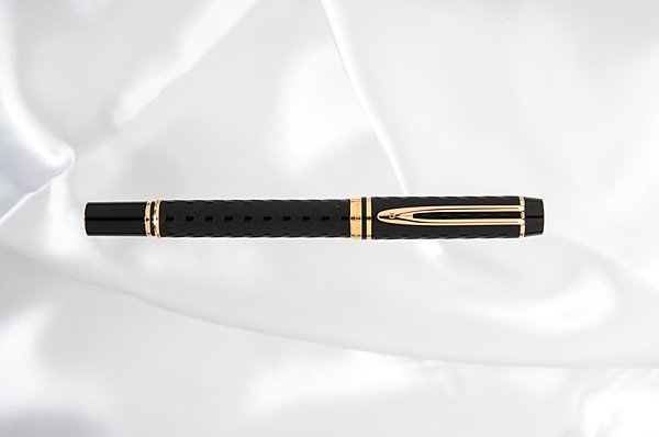 Waterman "Man 100 Opera" Fountain Pen : Waterman "Man 100 Opera" Fountain Pen In this pen Waterman has captured the charm of their early "teens" and teamed it with the beauty and design of today. The wavy etched design on the black acryli