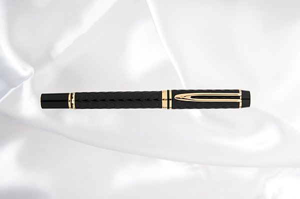 Waterman "Man 100 Opera" Fountain Pen : Waterman "Man 100 Opera" Fountain Pen In this pen Waterman has captured the charm of their early "teens" and teamed it with the beauty and design of today. The wavy etched design on the black acryli