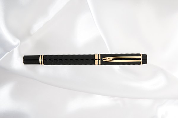 Waterman "Man 100 Opera" Fountain Pen : Waterman "Man 100 Opera" Fountain Pen In this pen Waterman has captured the charm of their early "teens" and teamed it with the beauty and design of today. The wavy etched design on the black acryli