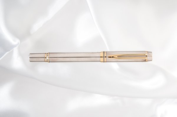 Waterman "Man 100" Specialty Sterling Fountain Pen : Waterman "Man 100" Specialty Sterling Fountain Pen Commemorating Waterman's 100th anniversary, this satin finished, solid (hallmarked) sterling silver body and cap provide a fine contrast to the gol