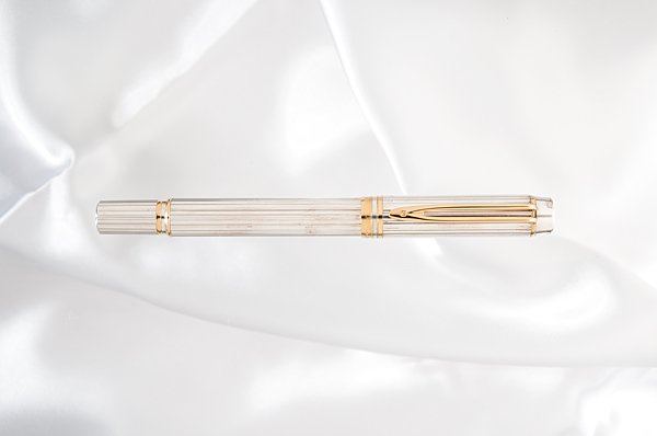 Waterman "Man 100" Sterling Silver Fountain Pen : Waterman "Man 100" Sterling Silver Fountain Pen Commemorating Waterman's 100th anniversary, this ribbed solid, hallmarked sterling silver body and cap contrasts the gold clip and accent rings. It is