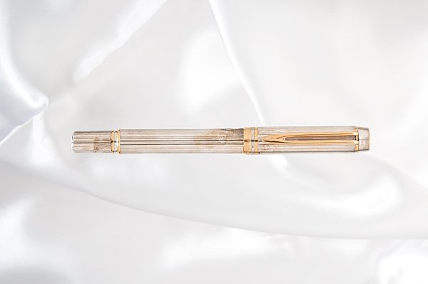 Waterman "Man 100" Sterling Silver Fountain Pen : Waterman "Man 100" Sterling Silver Fountain Pen Commemorating Waterman's 100th anniversary, this ribbed solid, hallmarked sterling silver body and cap contrasts the gold clip and accent rings. It is