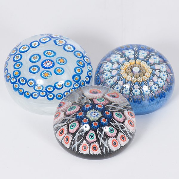 Assembly of Small Millefiori Paperweights : Assembly of Small Millefiori Paperweights This assembly of paperweights firstly includes a Perthshire Paperweight with a beautiful yellow cane center, with radiating ribbons dividing sections of sma