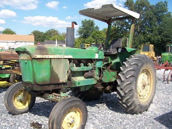 JOHN DEERE 4020 DIESEL FARM TRACTOR SIDE CONSOLE!: Tractor runs and operates. This tractor does not go in reverse. It may be something small it may be major I do not know. We will be selling this tractor "AS IS". This tractor comes with Diesel Engine,
