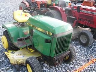 John Deere 318 L&G Tractor w/ Mower: JD 318 L&G Tractor w/ Mower. This unit runs and drives great, shows 974 hours. Has Power steering and hydro transmission!!!!! Tag # 18464 This is an auction to be held on our premises, on Monday Octob