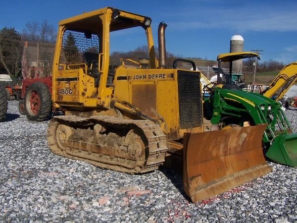 John Deere 450G Crawler Dozer w/ 6 Way Blade!!: Machine runs and operates good. We checked it out and everything works as it should. This machine comes with: Diesel Engine 6 Way Blade Factory Rops 60% Undercarriage Good Steering Clutches Shows 7200