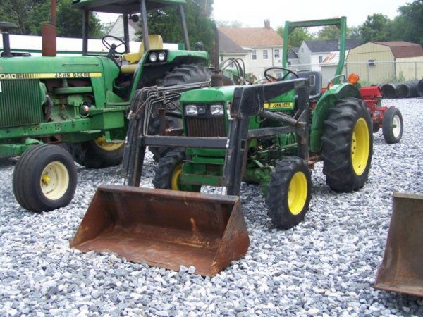 1988 John Deere 850 4x4 Tractor with Loader: This is a 24 hores diesel tractor with 2339 hours. This tractor has: 54" loader, 4x4,manual trans, R-1 Tires, and 2.4-24 rear tires. Serial # CH0850S029904 Tag #36543 G.W. McGrew Auction Company will