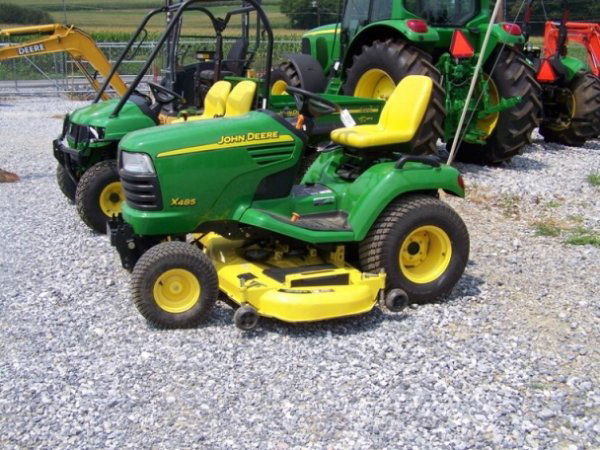 John Deere X485 Tractor w/ Mower: This is a John Deere X485 tractor with a 25 horsepower gas engine with 87 hours. This tractor has: hydrostatic transmission, 62" mower deck, differential lock, and aux. hydraulics. Serial # MOX485A040