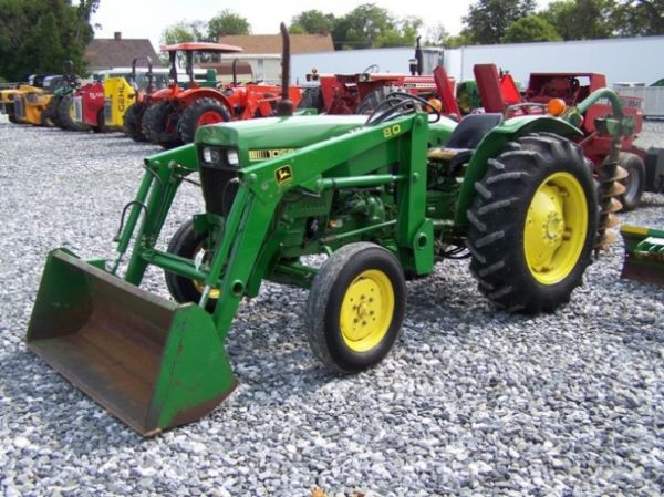 1980 John Deere 1050 Tractor with JD 80 Loader: This is a John Deere 1050 tractor with a John Deere 80 loader. This tractor has manual transmission with a 37 horsepower Yanmar diesel engine. This tractor has 62" bucket, Cat 1 3pt hitch with 540 PTO