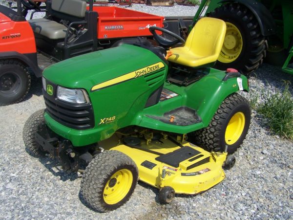 John Deere X748 4x4 Lawn and Garden Tractor: This is a like new John Deere X748 4x4 Lawn and garden tractor with 327 hours. This tractor is powered by a 24 horsepower diesel engine with a hydrostatic transmission. This tractor has 62" mower deck