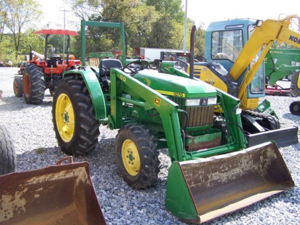 John Deere 1070 4x4 Compact Tractor with Loader: This is a 1997 John Deere 1070 4x4 compact tractor with loader. This tractor is powered by a 39 horsepower diesel engine with 995 hours. This tractor has new front tires, John Deere 80 loader, 3pt hit