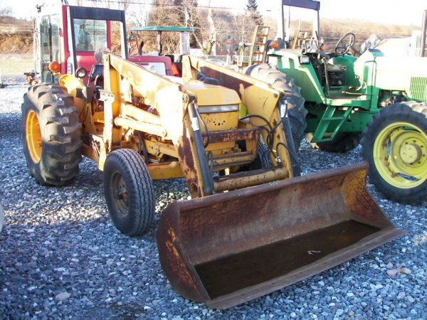 John Deere 2155 Tractor with Loader, 82" Bucket: This is a John Deere 2155 compact tractor with JD 110 loader. This tractor has a 55 horsepower diesel engine. This tractor has a 82" bucket, manual transmission, 3pt hitch with 540 shaft PTO, ROPS, an