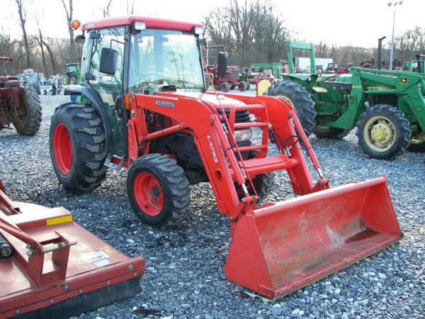 Kubota L3430 4x4 Compact Tractor with Cab Loader: This is a 2006 Kubota L3430 4x4 compact tractor with cab and LA723 loader. This tractor has a 35 horsepower diesel engine that shows 490 hours. This tractor has a hydrostatic transmission, 72" quick a