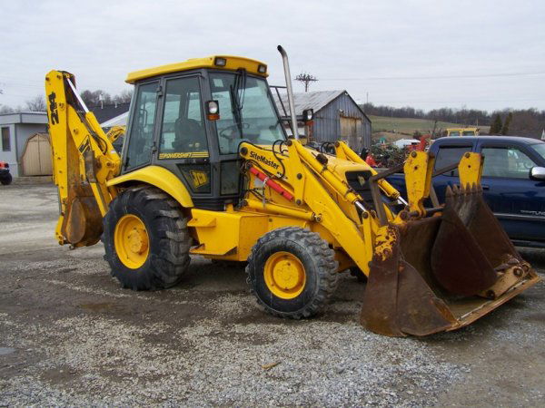 JCB 214E Tractor Loader Backhoe Extenda Hoe: This is a Nice one owner JCB 214 E sitemaster 4x4 tractor loader backhoe with extenda hoe. This backhoe has 3925 hours and is powered by a 86 horsepower diesel engine. This backhoe has EROPS with heat