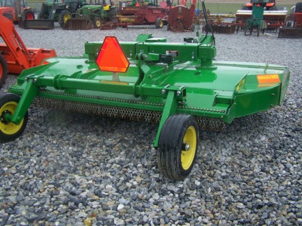 John Deere MX 10' Pull Type Rotary Mower Tractors: This is a Like New John Deere MX10 10' pull type rotary mower for tractors. This mower was used very little and has hydraulic lift, chain kit, dual tail wheels, dual blades, and runs off a 540 shaft P