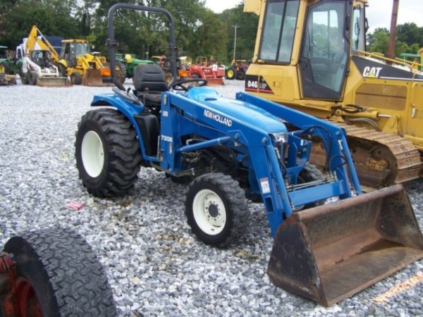 New Holland TC33D 4x4 Compact Loader Tractor