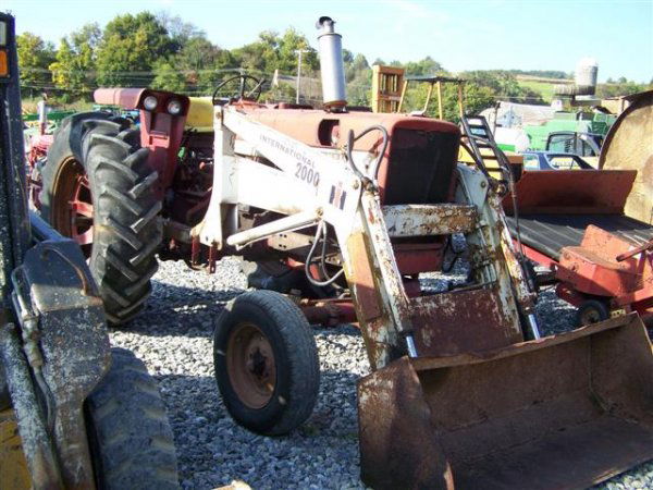 International 656 Farm Tractor with Loader, Fender: International 656 Farm Tractor with IH 2000 Loader, 61 Horsepower PTO, 6717 Hours, Fenders, 2 Remotes 540 PTO, and 18.4-38 Rear Tires. This is a due not miss event, you will not believe the Quantity o
