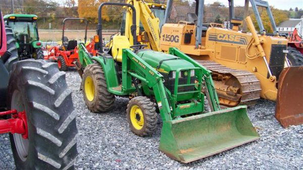 John Deere 4310 Compact Tractor Loader Backhoe: 2003 John Deere 4310 4x4 Compact Tractor with JD 420 Loader and JD 47 Backhoe, 32 Horsepower, Power Reverser, 168 Hours, 62" Bucket, 10" Backhoe Bucket, 3pt Hitch With 540 Shaft PTO, and 15x19.5 Rear