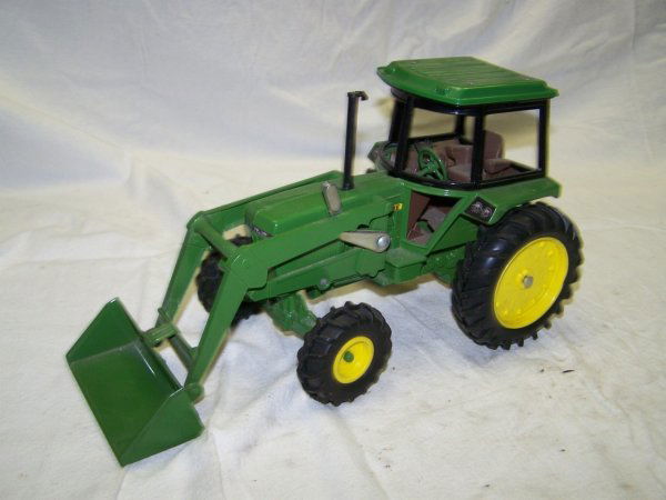 John Deere Toy Tractor with Loader and Cab: John Deere Toy Tractor with Loader and Cab. This is a due not miss event, you will not believe the Quantity or the QUALITY!!! This auction is to be held at The Seven Valleys Fire Hall, 35 Main Street,