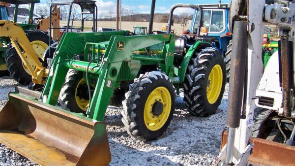 John Deere 5400 4x4 Farm Tractor with Loader: John Deere 5400 4x4 Farm Tractor with 540 Loader, 67 Horsepower PTO, Manual Trans, 540 PTO,2 Remotes,3107 Hours,and 16.9-30 Rear Tires. Serial # LV5400E540639 This is a due not miss event, you will no