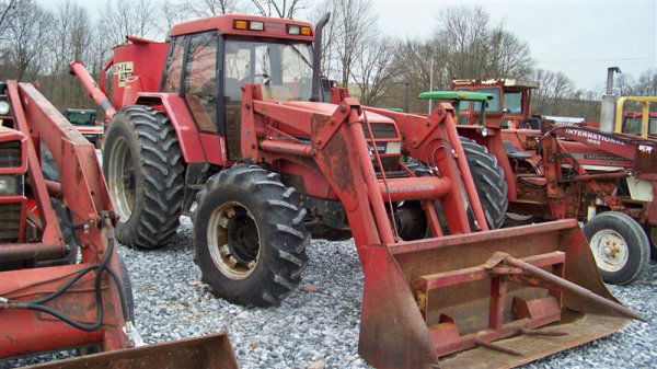 Case IH 5130 4x4 Farm Tractor with Cab and Loader: Case IH 5130 4x4 Farm Tractor with Cab and 510 Loader, 86 Horsepower, Heat Air, 2 Doors, 84" Bucket, 7231 Hours, Left Hand Reverser,Heat Air, 540 PTO, 2 Remotes, and 18.4R38 Rear Tires. Serial # JJF10