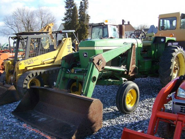 John Deere 4030 Farm Tractor with Loader: John Deere 4030 Farm Tractor with Loader, Quad Range, 80 Horsepower PTO, R&P Axles, 2 Remotes, Dual PTO, Shows 4858 Hours and 15.5-38 Rear Tires. Serial #4030H04709 This is a due not miss event, you w