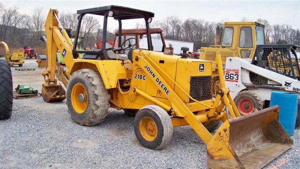 John Deere 210C Tractor Loader Backhoe with OROPS,: John Deere 210C Tractor Loader Backhoe with OROPS, 55 Horsepower, 1986 Model, 80" Front Bucket, 24" Backhoe Bucket, 8974 Hours and 16.9/14-24 Rear Tires. Serial #TO210CA732035 Stock # 23275 This is a