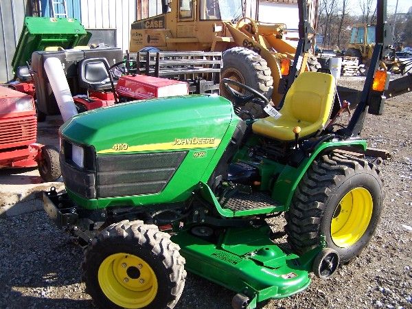 JOHN DEERE 4110 4x4 COMPACT TRACTOR W/ MOWER 110: JD 4110 4x4 Compact Tractor. Tractor has 60" Belly mower, R-4 Tires, Hydro trans., 113 org. hours and a loader valve. Very nice tractor, we bought it from a local man that ran into Money problems. We