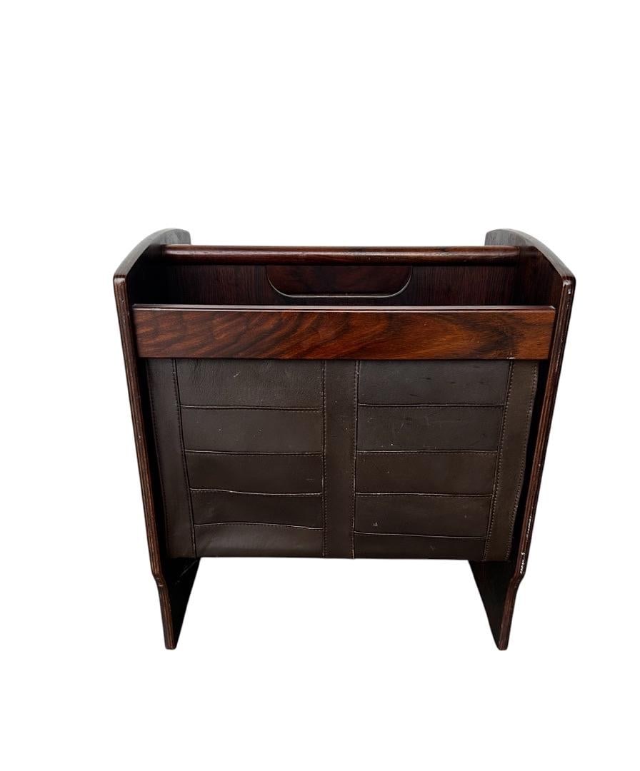 Rosewood Magazine Rack/Holder, Denmark: Rosewood Magazine Rack/Holder, Denmark. 17”H x 15”W x 11”PLEASE BY ADVISED, THE JOLIET WAREHOUSE MUST BE VACATED BY MARCH 31ST. THEREFORE, ITEMS MUST BE PICKED UP ON DESIGNATED PICK-