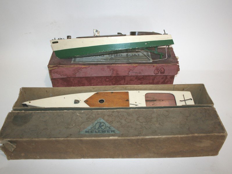 TRIANG MODEL SPEED BOAT a boxed Triang Speed Boat,: TRIANG MODEL SPEED BOAT a boxed Triang Speed Boat, Solent, with a wooden hull. Also with a boxed Kellner Speed Boat, with a wooden hull and clockwork mechanism, a Picabrix Cottage Set and a bagatelle.