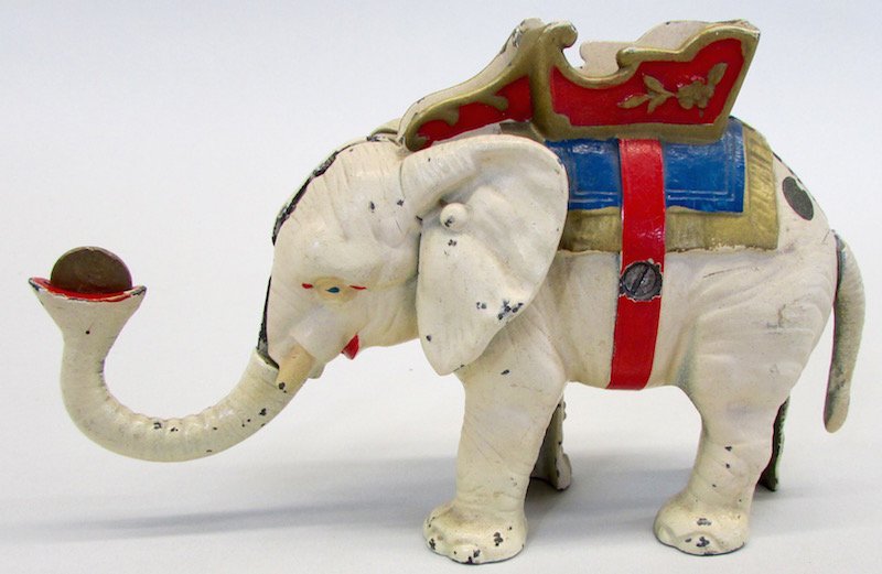 Hubley Cast Iron Mechanical Elephant Bank: Retains most of the original round "Hubley Toy Line" decal, as well as most of the original paint. Height 5 1/2 inches.