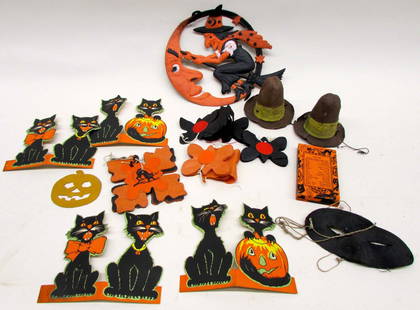 Lot of Vintage Halloween Decorations: Including paper lantern, fold-out garlands, cut-out masks and decorations, and printed materials.