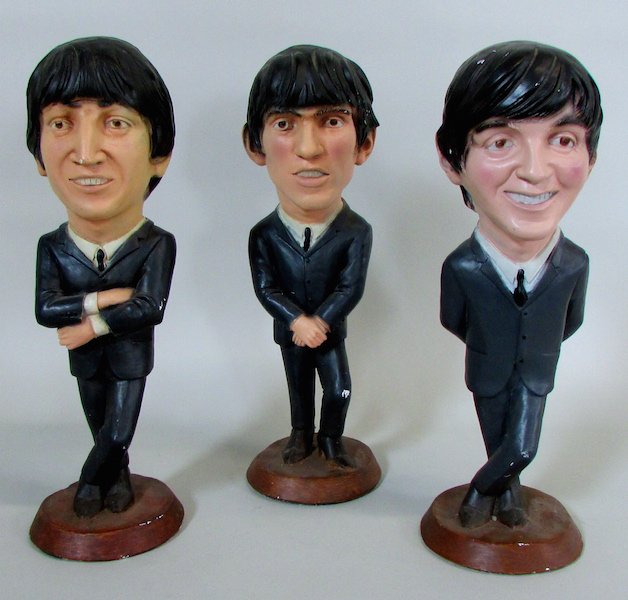 3 Molded Beatles Figures by Esco Products c.1980.: Chalkware figures of John Lennon, Paul McCartney and George Harrison by Esco Products. Each with detailed but oversized head and marked \"Esco Prod. Inc.\" Height 18 inches. Set is missing Ringo Starr