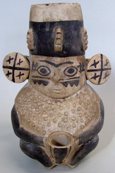 Large Inca Vessel: Of figural form with ornate headdress and earrings, holding a small jar. Height 9 1/2 inches.
