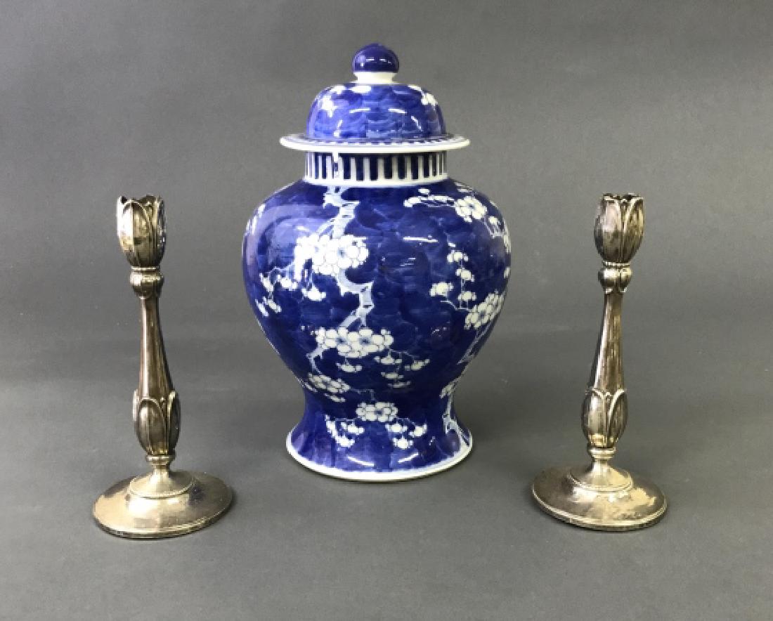 Pair of Weighted Sterling Silver Candlesticks (1 of 2)