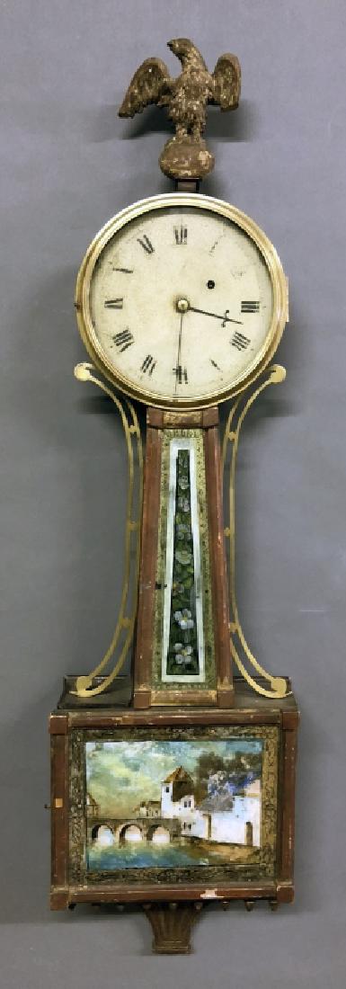 Presentation Mahogany Cased Banjo Clock: Presentation mahogany cased banjo clock, 19th c, with brass works by Thomas, as found, 40"h. W.A.I. does not guarantee clocks to be complete or in working condition.