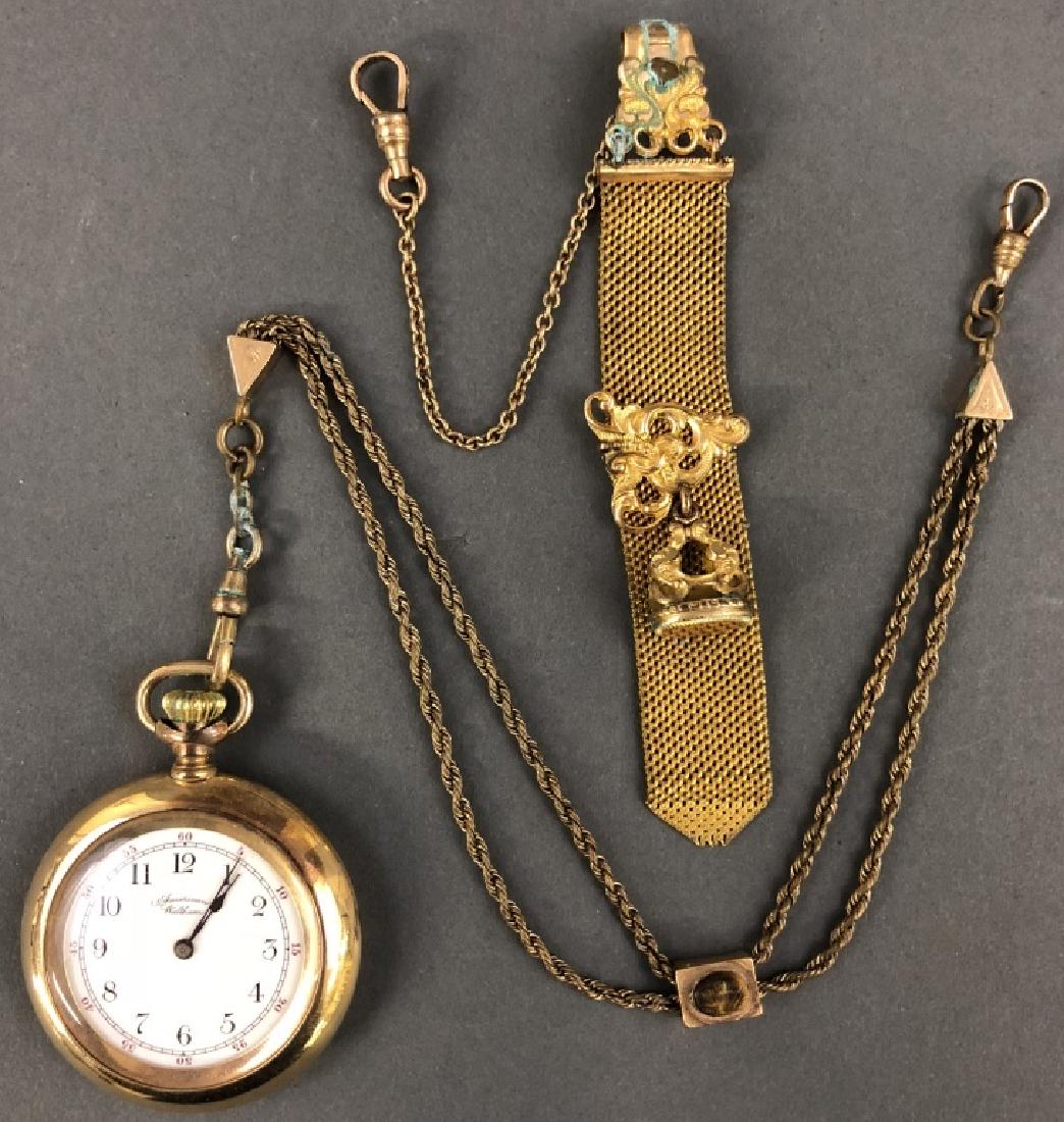 14K Gold Waltham Pocket Watch: 14K yellow gold Waltham pocket watch, 1 3/4" dia, together with a gold colored fob. W.A.I. does not guarantee watches to be complete or in working condition. No credit cards accepted on this lot.