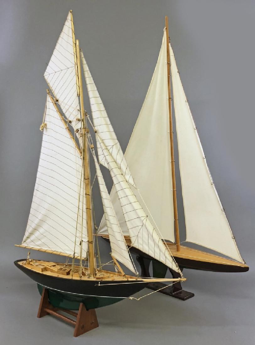 Two Ship Models: Sloop ship model, gaft rigged, 41"h x 30"'w, together with another model